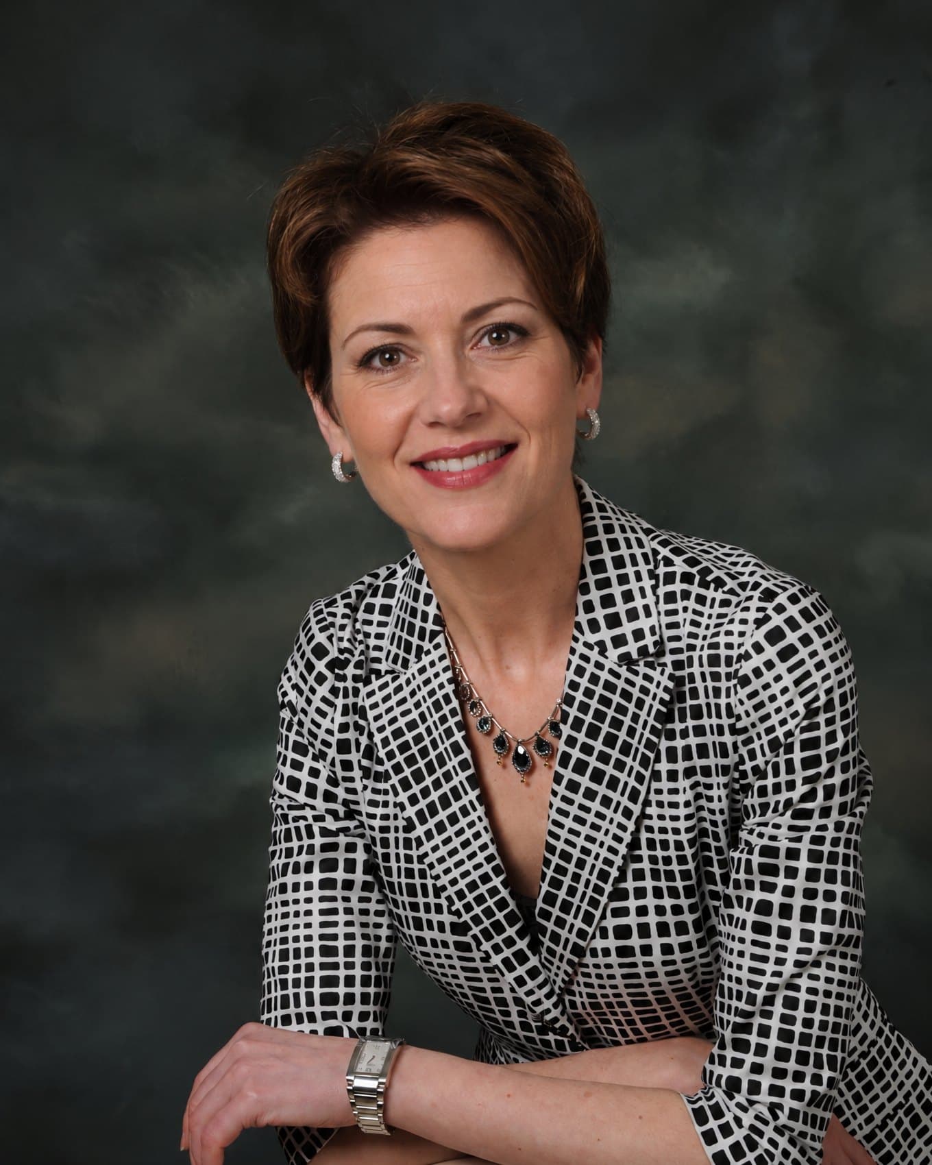 A woman in a checked jacket
